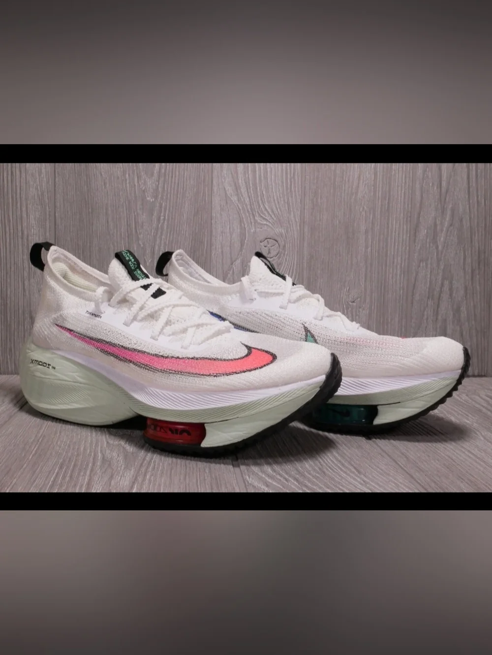 Nike Women’s White and Pink Performance Running Sneaker - Picture 2 of 3